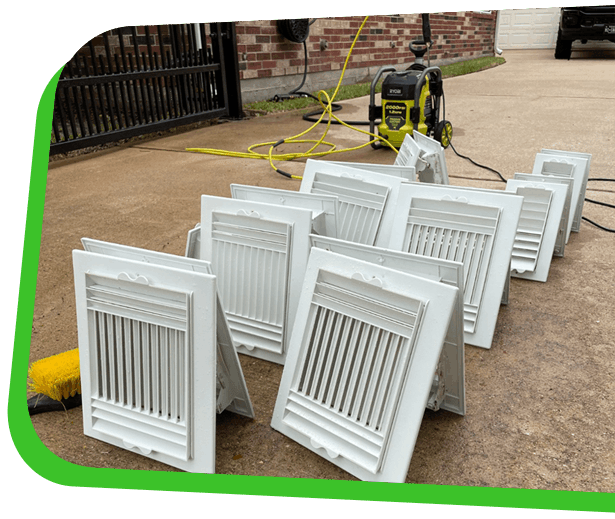 Air vent cleaning service in North Carolina with removed HVAC vent covers
