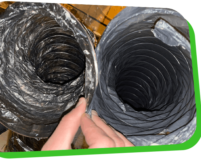 Professional ductwork cleaning in North Carolina removing dust buildup from HVAC air ducts